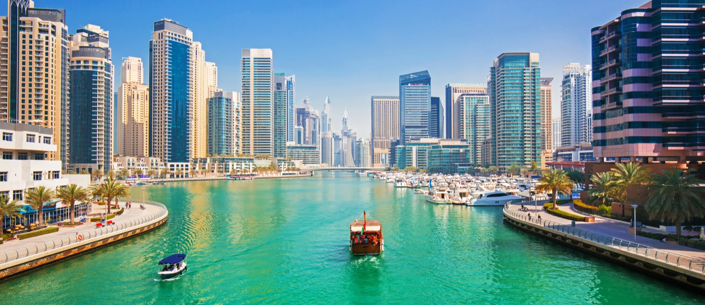 Marina flanked by skyscrapers 